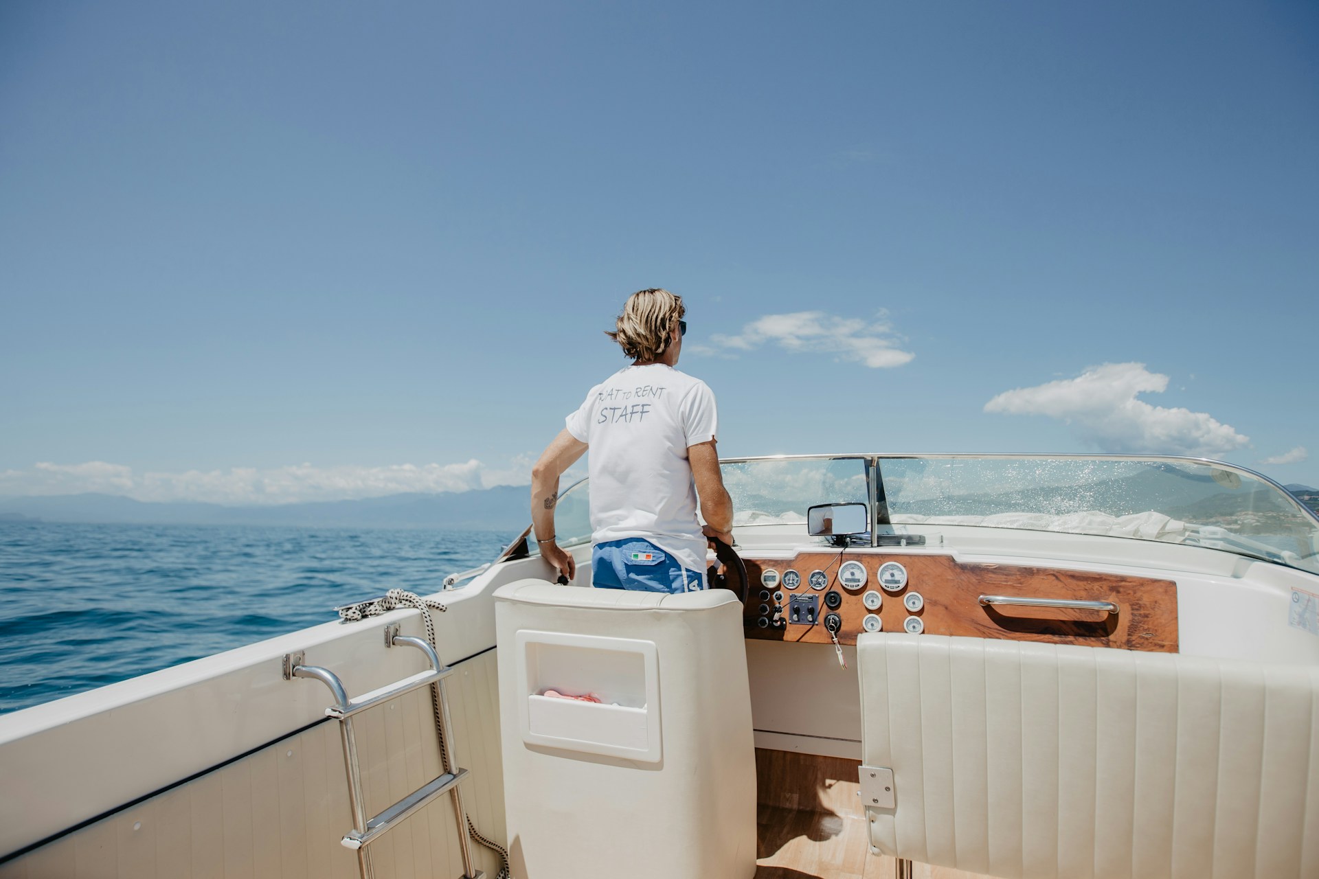 Person standing on a charter boat