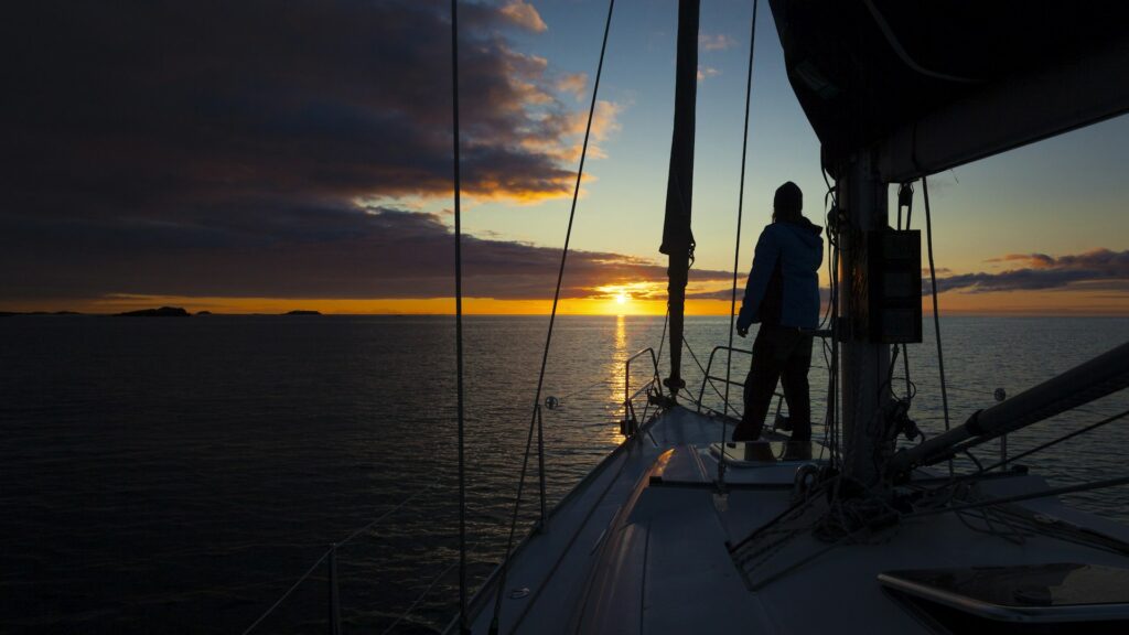 Charter captain on deck at sunset